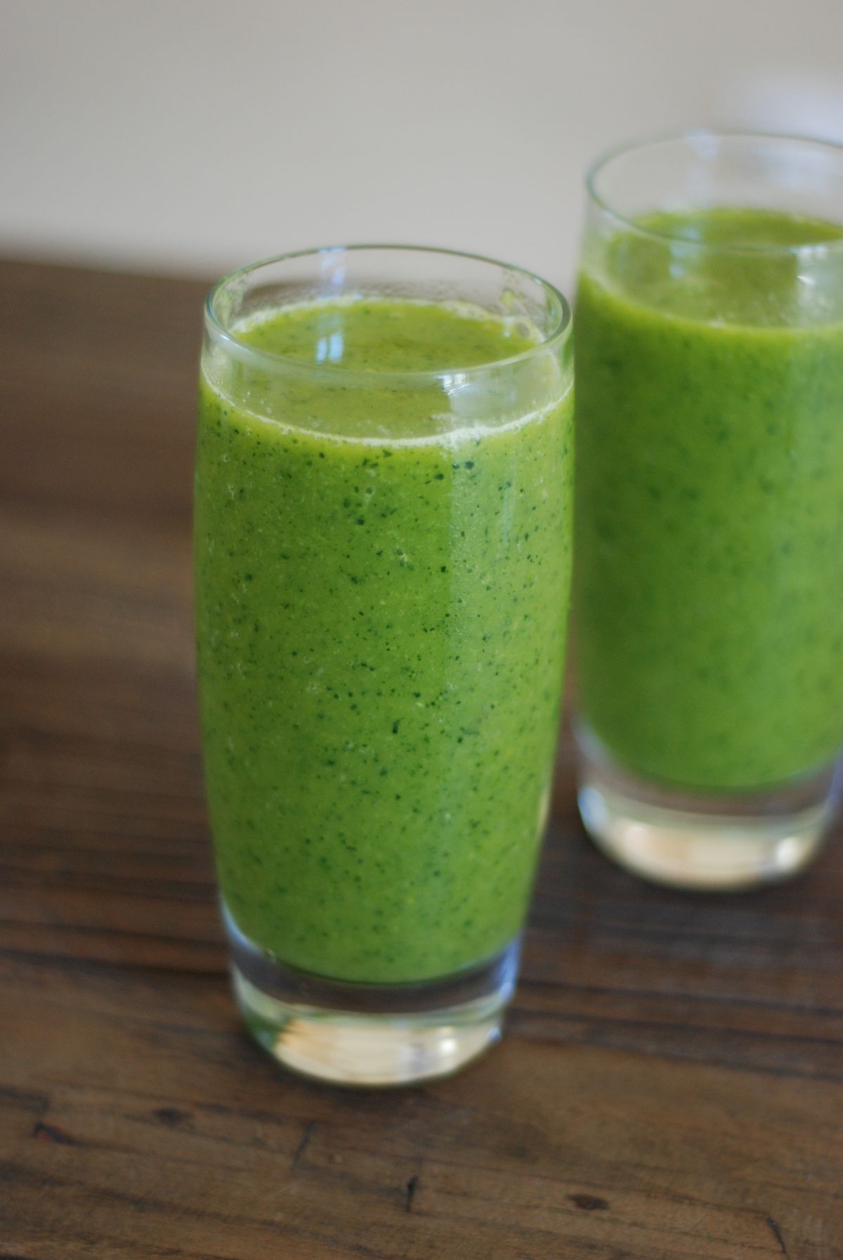 Fresh green kale smoothie made in a personal blender